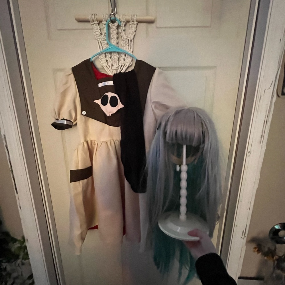 A Nene cosplay from TBHK. A small and hairpieces are included​